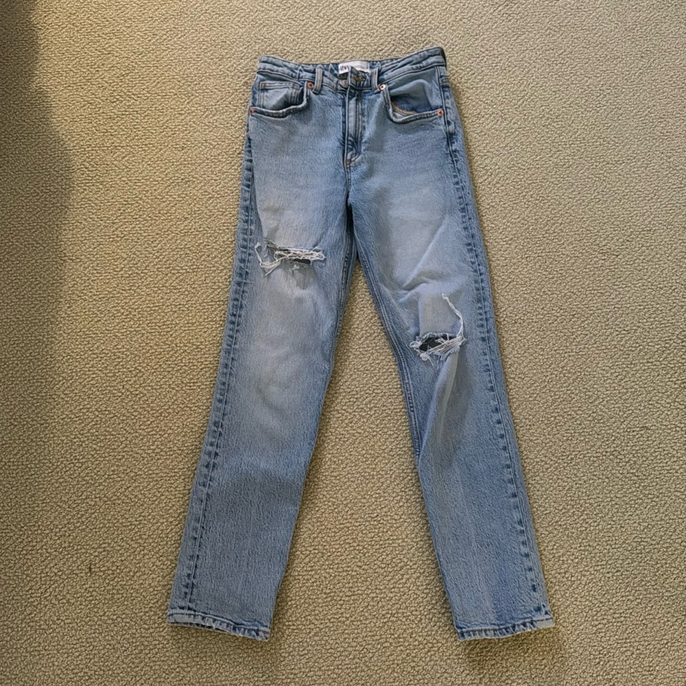 Zara light washed mid-waisted jeans.